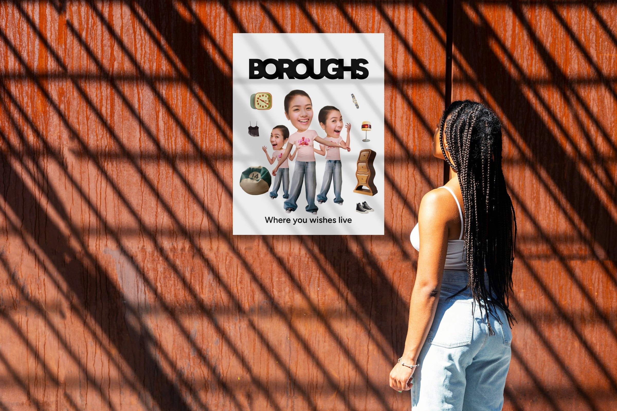 Woman looking at a Boroughs poster on a rusted orange wall